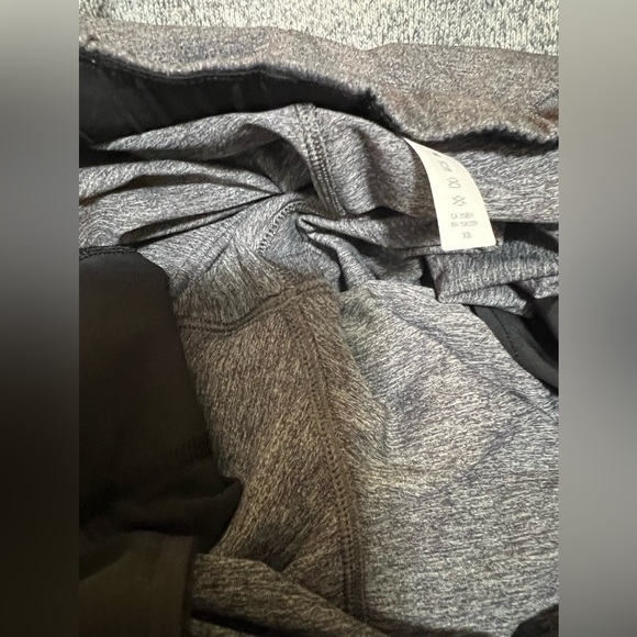 12. Lululemon On The Fly Pant *27" Heathered Black - Picture 16 of 16